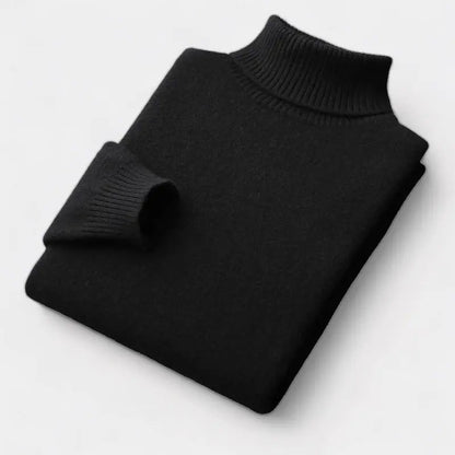 Folded roll-neck jumper in black, with the ribbed collar and one cuff showing 5