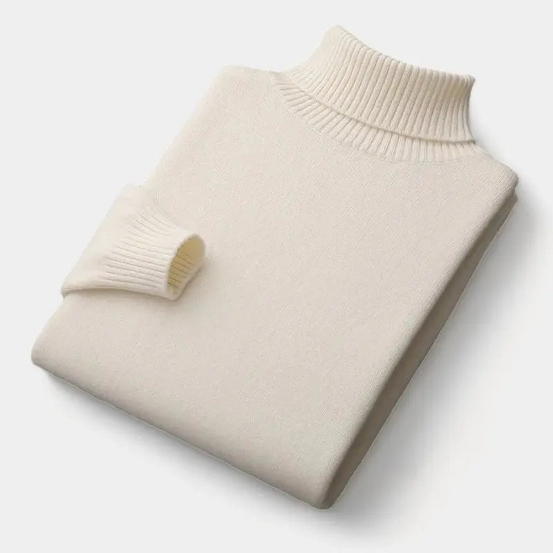 Folded roll-neck jumper in cream, with the ribbed collar and one cuff showing 4