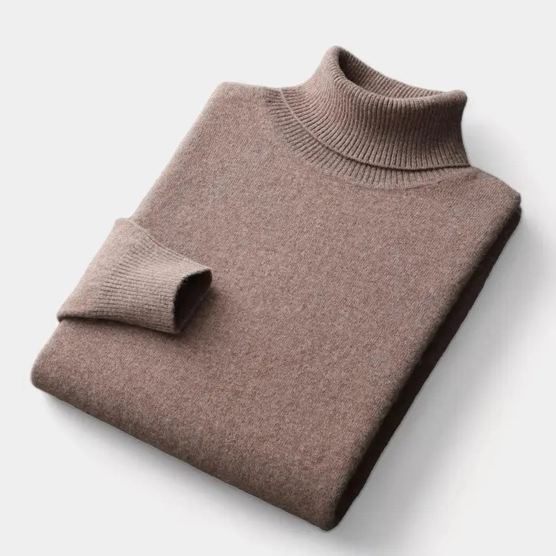 Folded roll-neck jumper in warm taupe brown, with the ribbed collar and one cuff showing 9