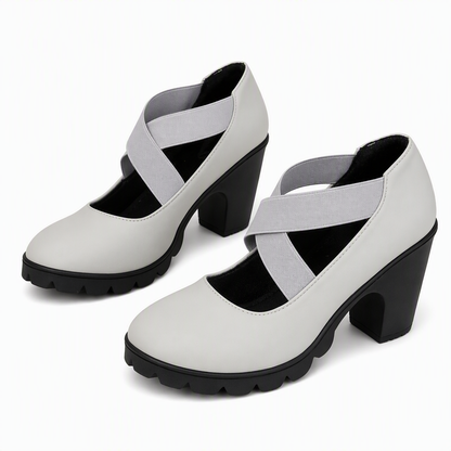 Pair of light grey block heel shoes with matching grey crossed elastic straps and chunky black treaded soles. 9