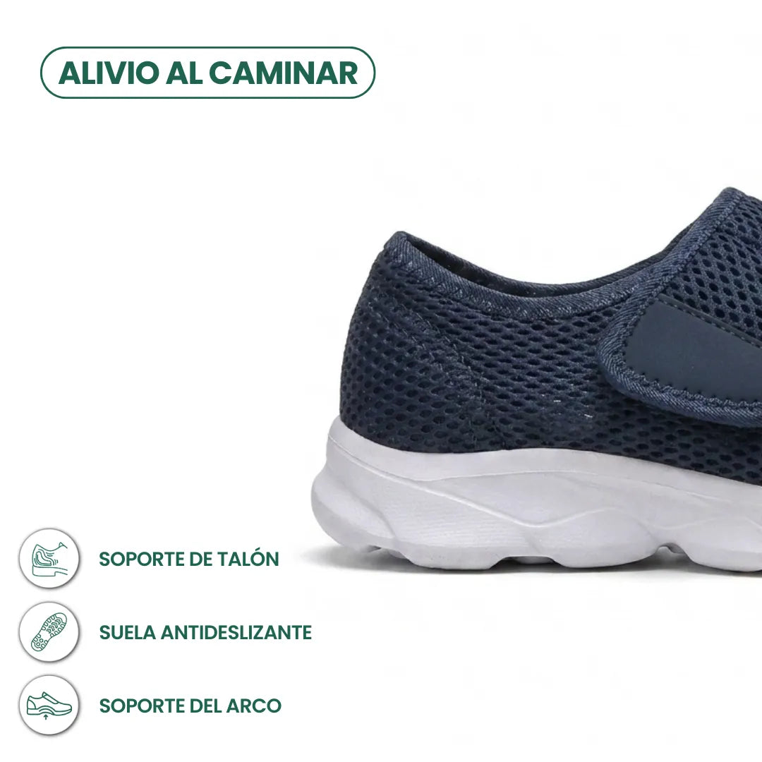 Close-up of the navy shoe's heel and white sole, with comfort feature icons 4