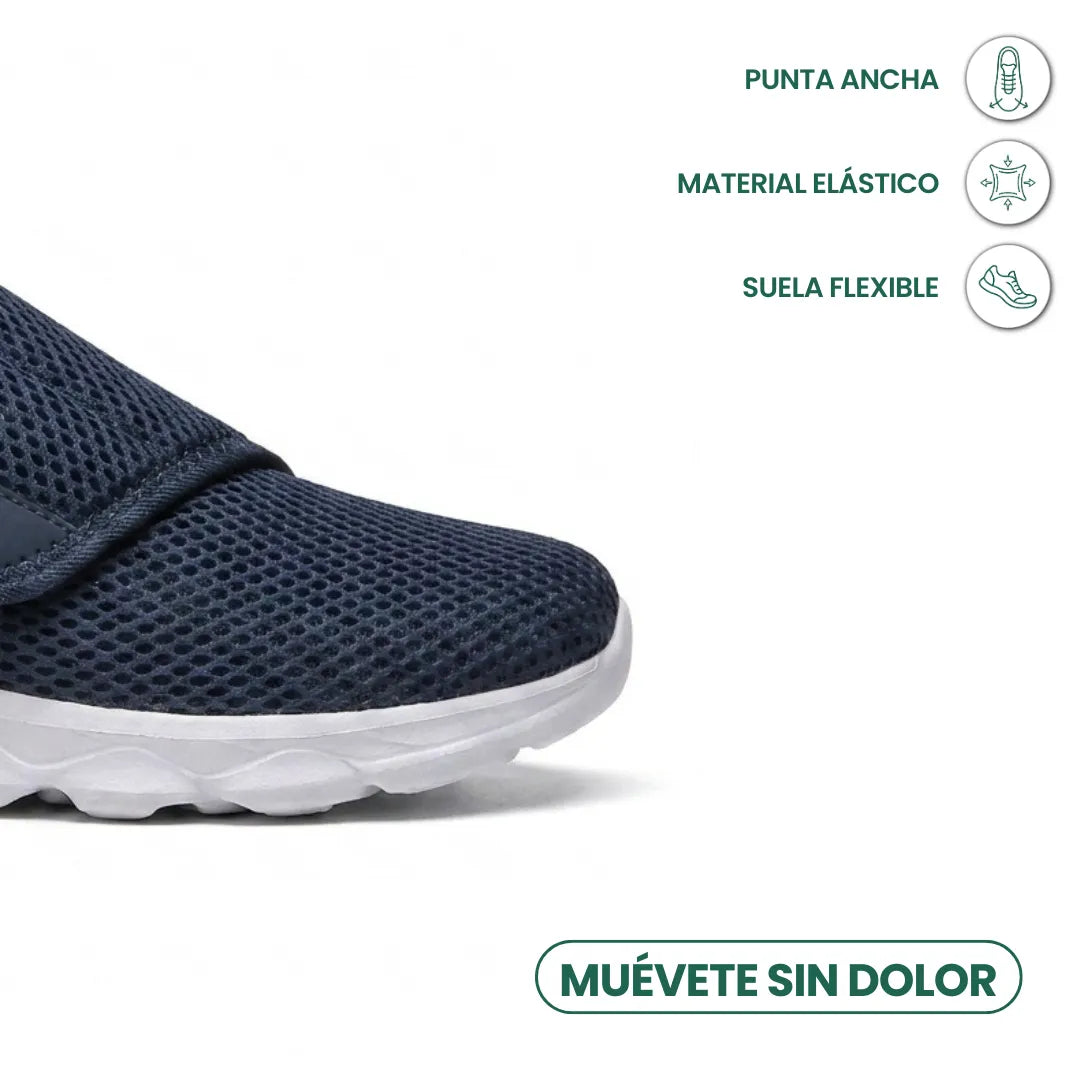 Close-up of the navy shoe's wide toe box and flexible sole, with feature icons 5