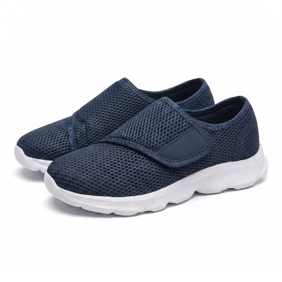 Pair of navy mesh hook-and-loop shoes with white soles, angled three-quarter view 7