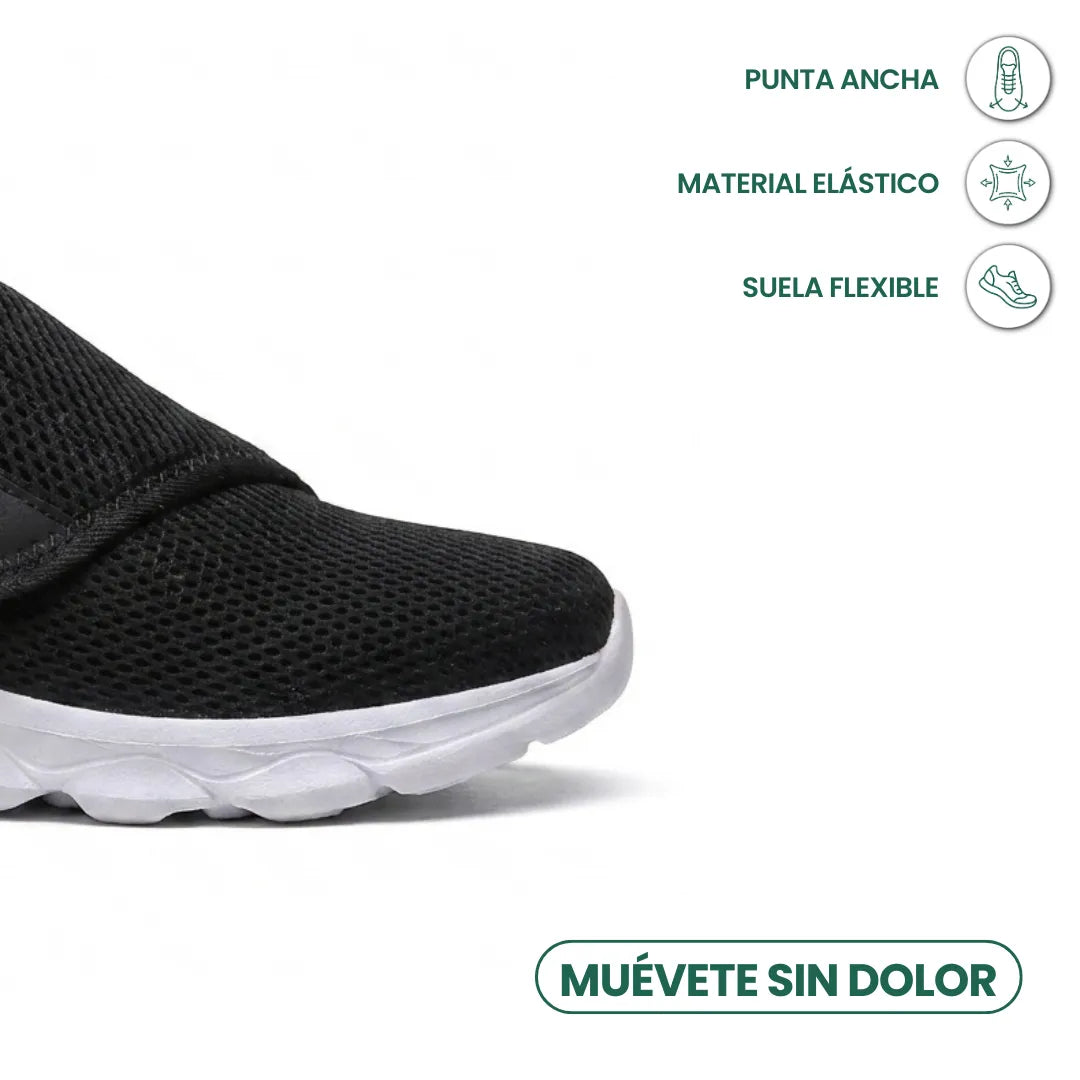 Close-up of the black mesh toe box and white sole with icons for wide toe and flexibility 23