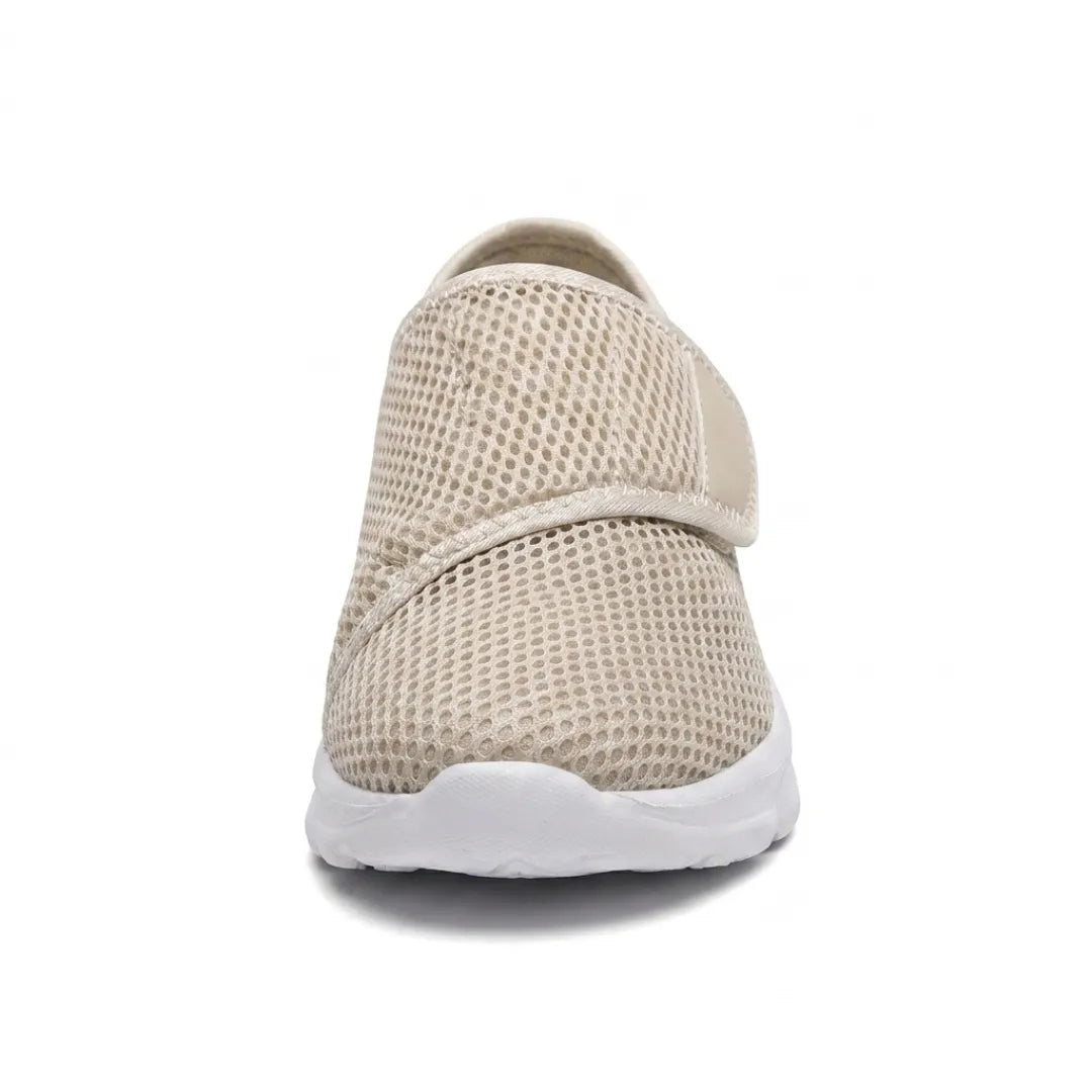 Front view of a beige mesh shoe showing the wide rounded toe and strap across the foot 35