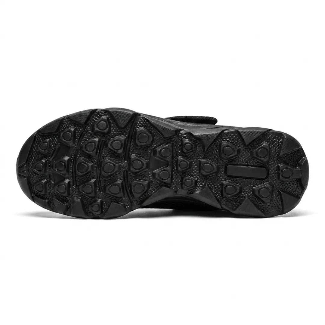 Black rubber outsole with a studded grip pattern, seen from underneath 18