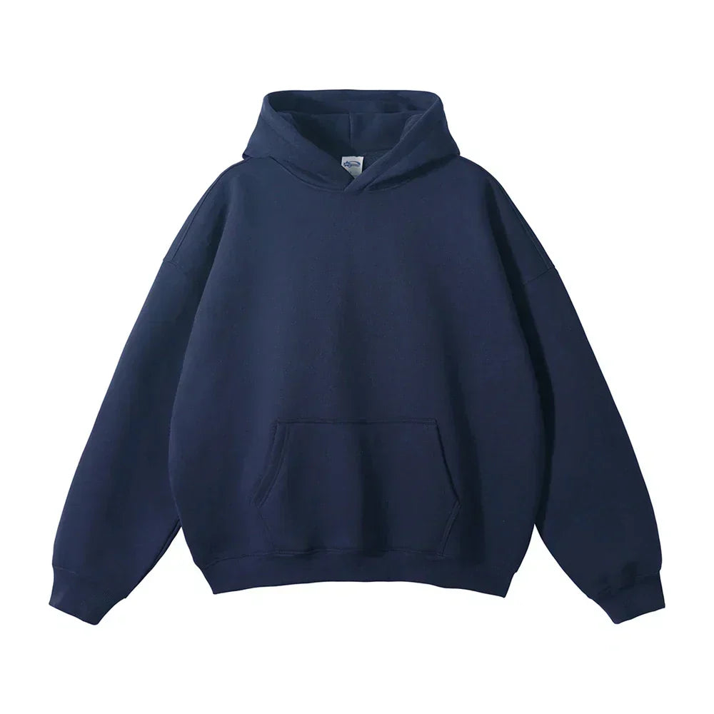 Navy blue pullover hoodie laid flat, front view, showing drop shoulders, ribbed cuffs and hem, hood and large front kangaroo pocket. 2