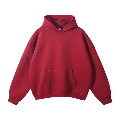 Front view of a plain deep red hooded sweatshirt laid flat, showing the drop shoulders, ribbed cuffs and hem, and large front pocket. 13