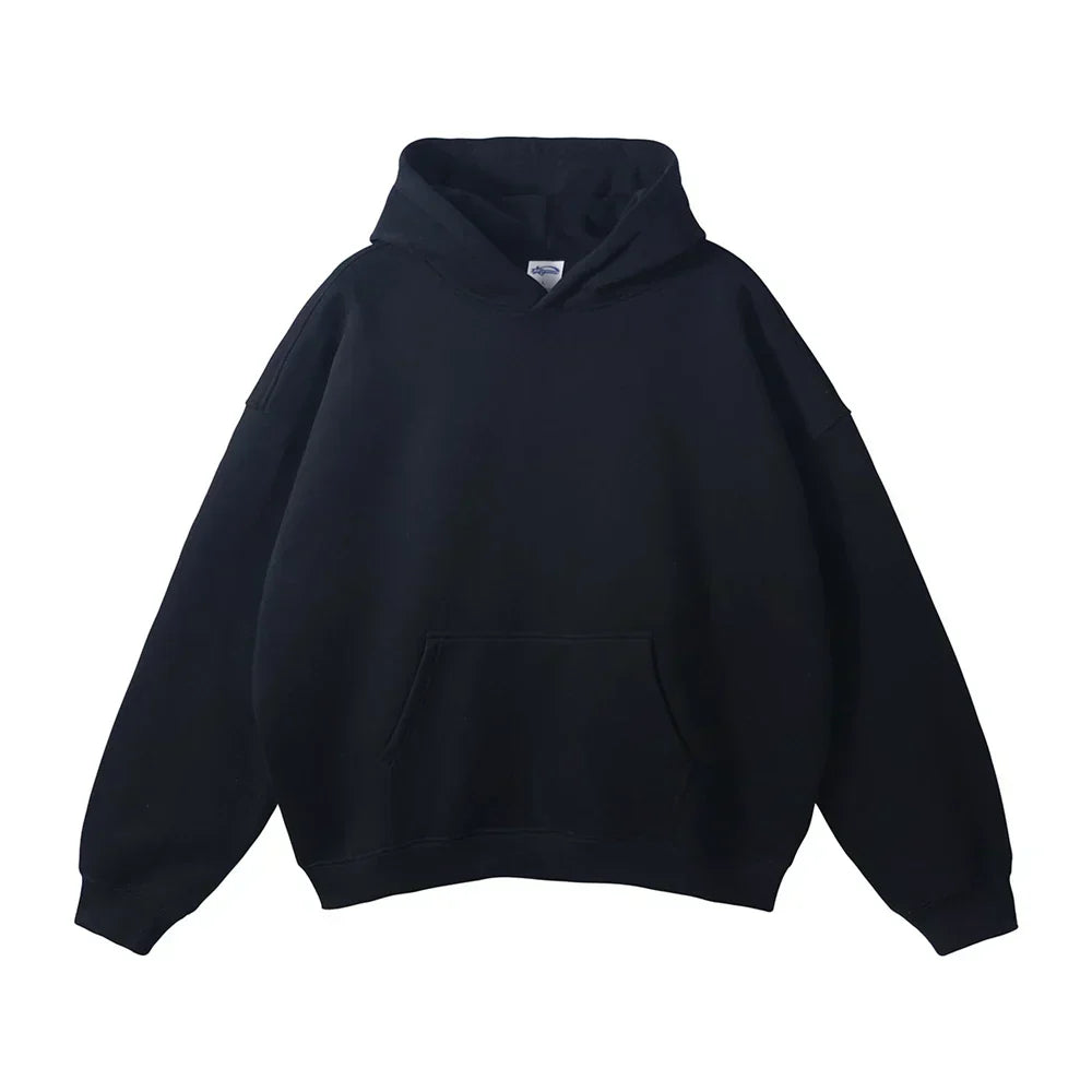 Front flat view of a plain black pullover hoodie with drop shoulders, ribbed cuffs and hem, and a front kangaroo pocket. 16