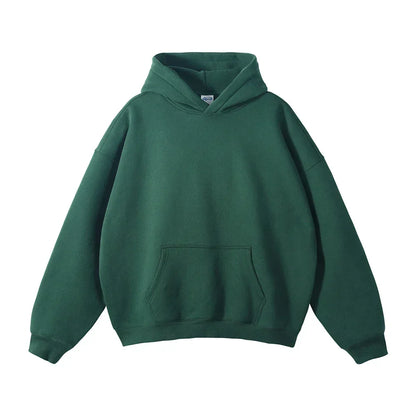 Front view of a plain dark green hoodie laid flat, showing its drop shoulders, ribbed cuffs and hem, and large front pouch pocket. 18