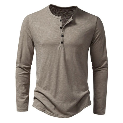 Long-sleeved four-button henley in taupe-grey with a slubby texture, shown flat from the front 1