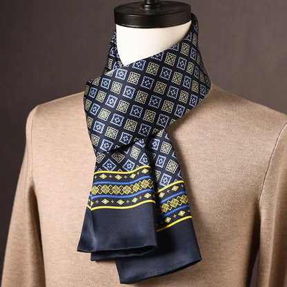 Dark navy silk scarf with a blue and yellow square motif and a yellow and blue striped border, worn on a mannequin. 22