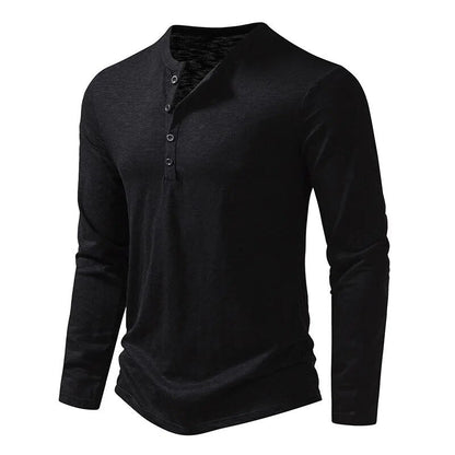Black long-sleeved henley photographed at an angle, showing its four-button placket and slim fit 15