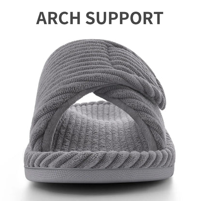 Front view of a grey ribbed slide slipper showing the crossed adjustable strap, open toe and thick moulded rubber sole. 3