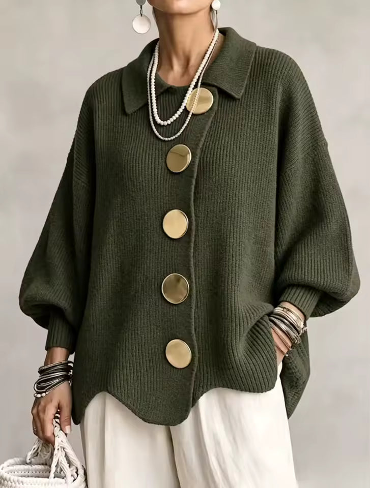 Model wearing the dark olive green version, shown from the front with gold buttons and a scalloped hem. 4