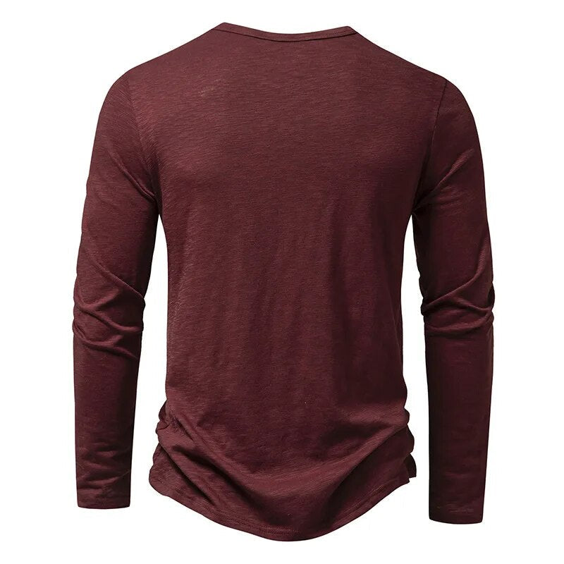 Back view of the burgundy long-sleeved henley, plain with a curved hem 13