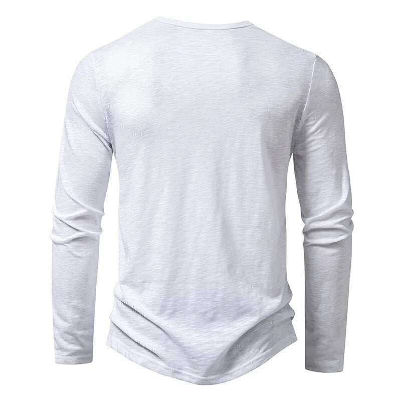 Back view of the white long-sleeved henley, plain with a round neckline 11