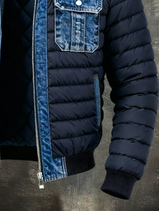 Close-up of the lower front and sleeve showing horizontal quilting, ribbed cuff and hem, zip and side pocket 3