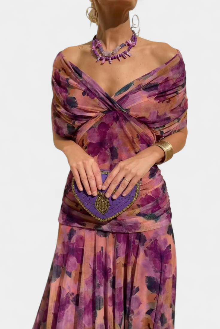 Close-up of the purple floral version, showing the twisted off-the-shoulder neckline and ruched waist. 8