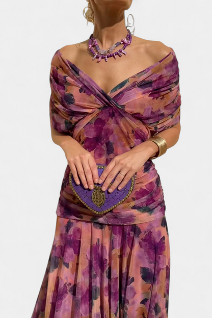 Close-up of the purple floral version, showing the twisted off-the-shoulder neckline and ruched waist. 8