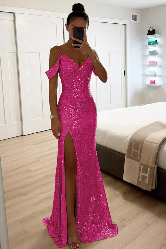 Woman in the hot pink sequin version, posing in a mirror with the high slit visible 2