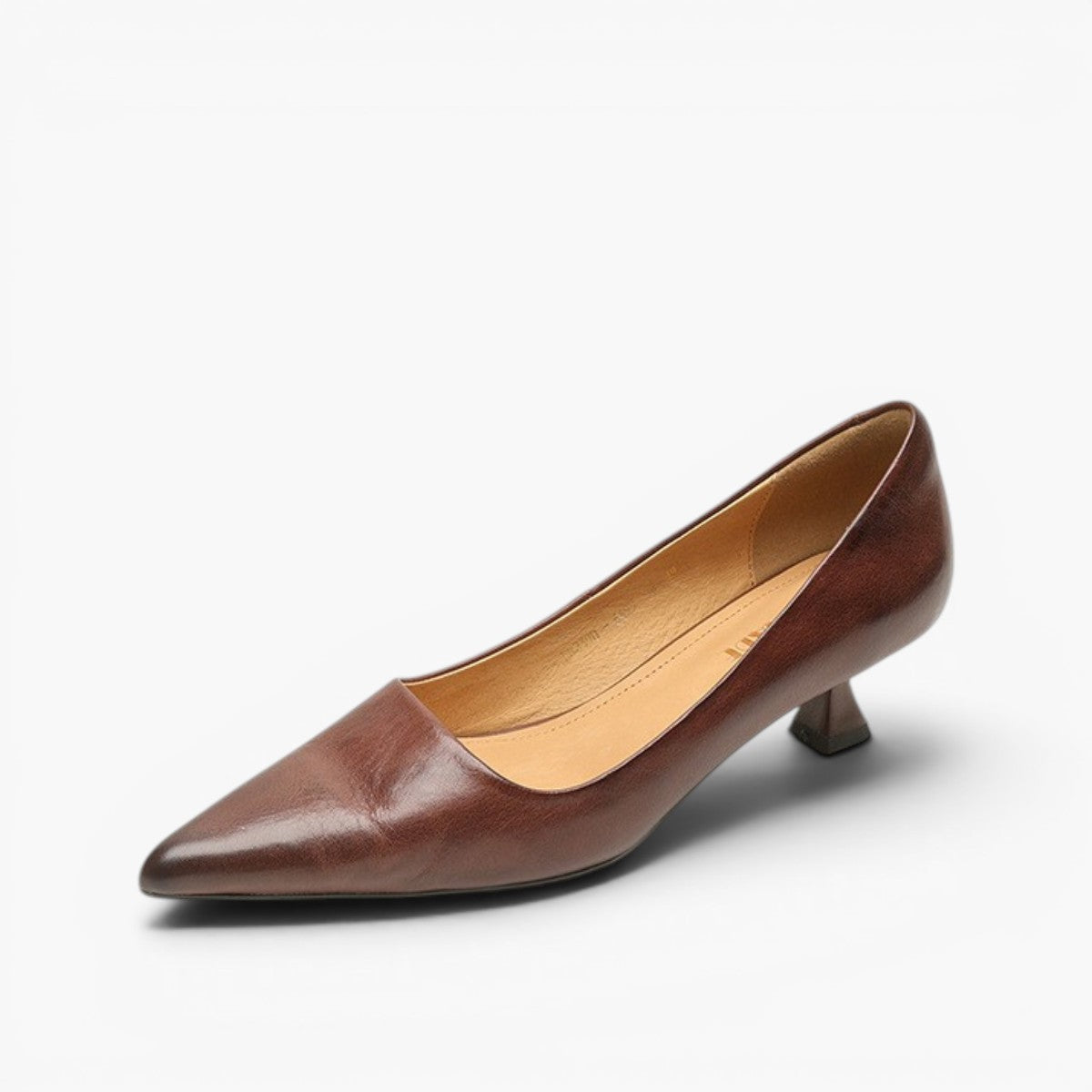 Single brown leather pump on a white background, angled to show tan lining and kitten heel 17