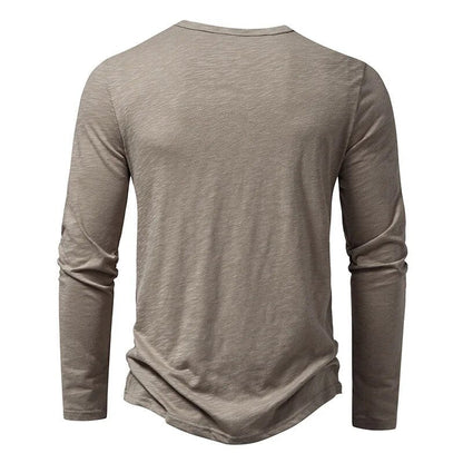 Back view of the taupe-grey long-sleeved henley, plain with a round neckline and curved hem 3