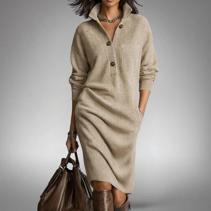 Front view of the beige ribbed knit dress with button placket, worn with a brown leather bag 6