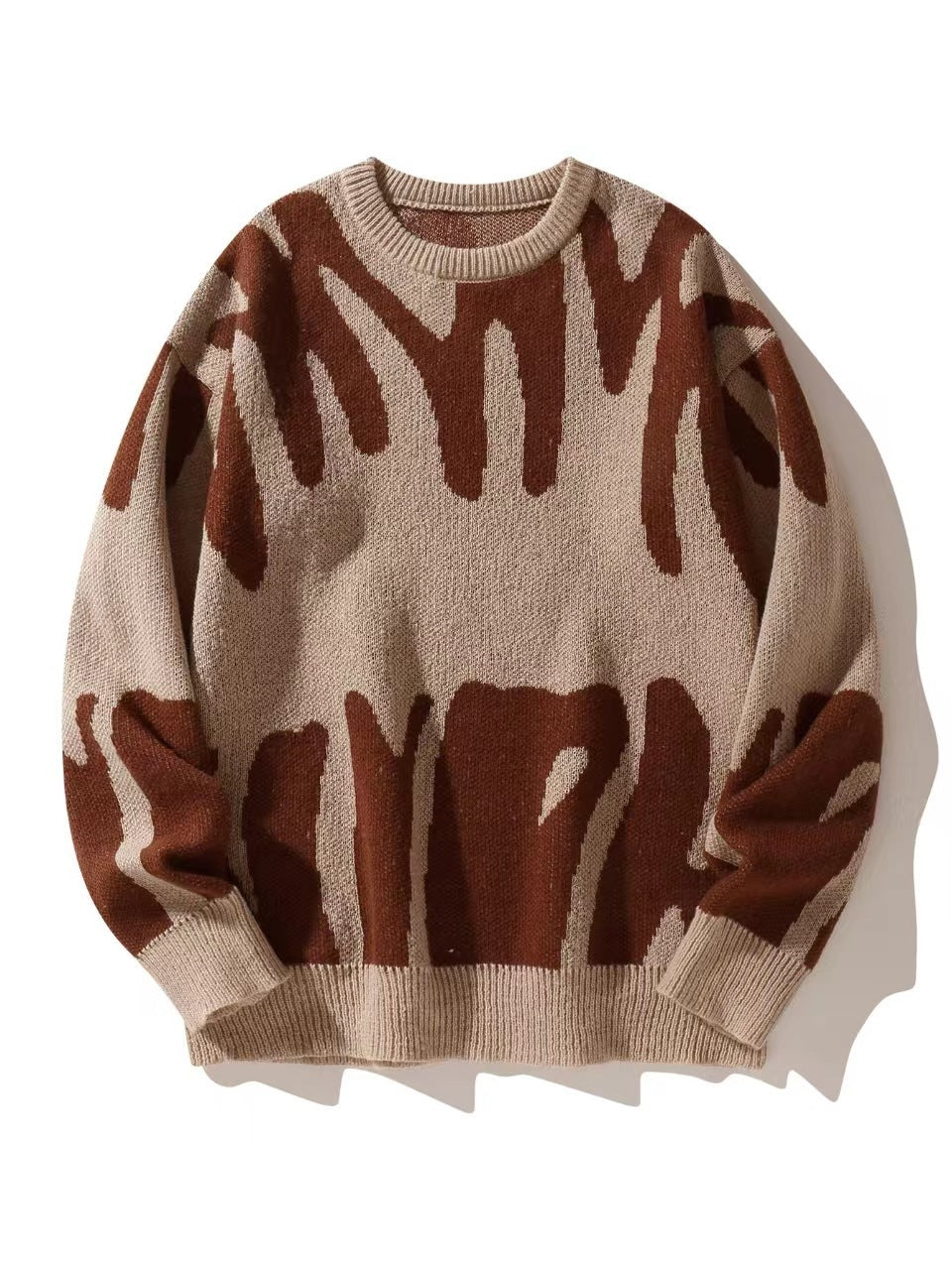 Flat lay of the knitted jumper in beige with a rust brown abstract pattern 5