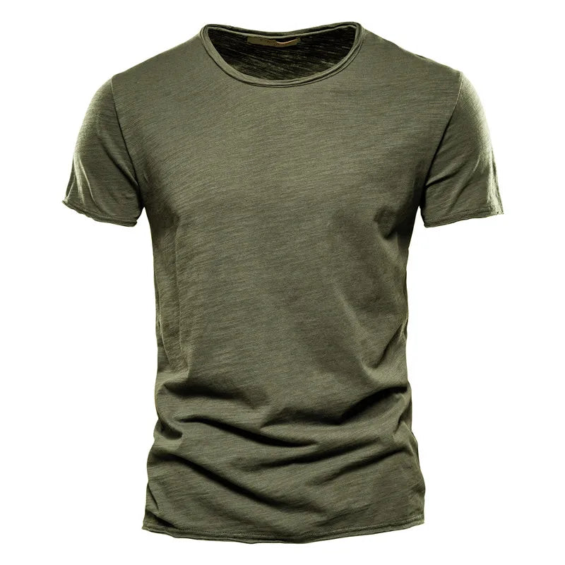 Front view of the short-sleeved crew-neck t-shirt in army green, showing the slub texture and raw-edged neck and sleeves. 9