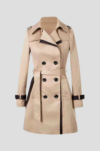 Beige double-breasted trench coat with dark trim, shown flat against a plain background with the belt tied 1
