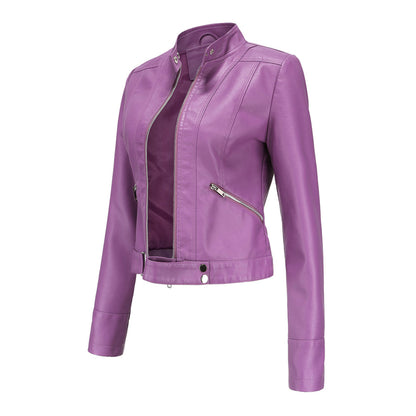 Three-quarter side view of the bright purple jacket, unzipped, showing diagonal zip pocket, stitched panels and snap hem tab. 14