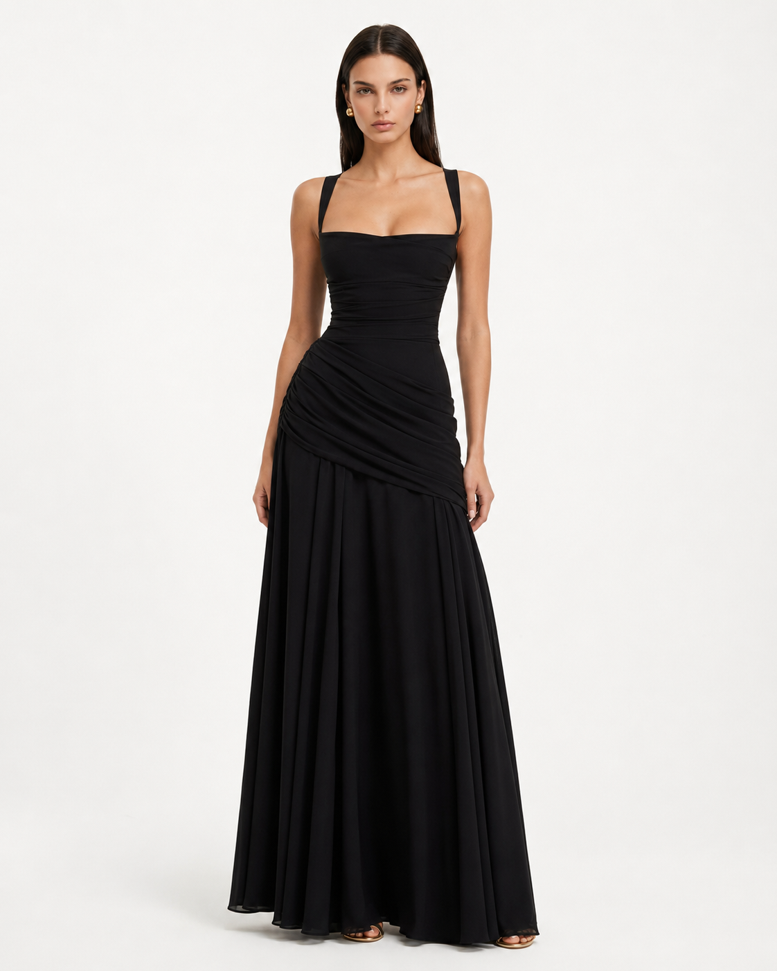 Front view of the black maxi dress, showing the square neckline, gathered waist and flowing skirt. 18