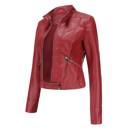 Three-quarter side view of the red jacket, unzipped, showing collar studs, diagonal zip pocket and snap-fastened hem. 10