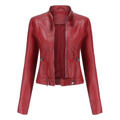 Front view of the jacket in deep red, unzipped, with stand collar, zip pockets and buckled waist tab. 3