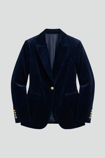 Navy velvet blazer laid flat from the front, showing peaked lapels, one gold button and flap pockets 1