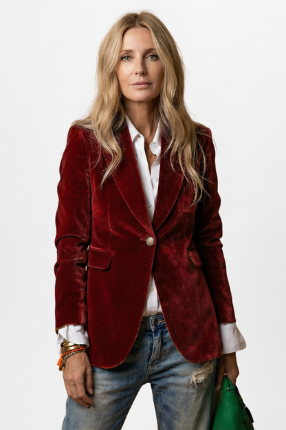 The blazer in deep red velvet, worn by a model with a white shirt and jeans 7