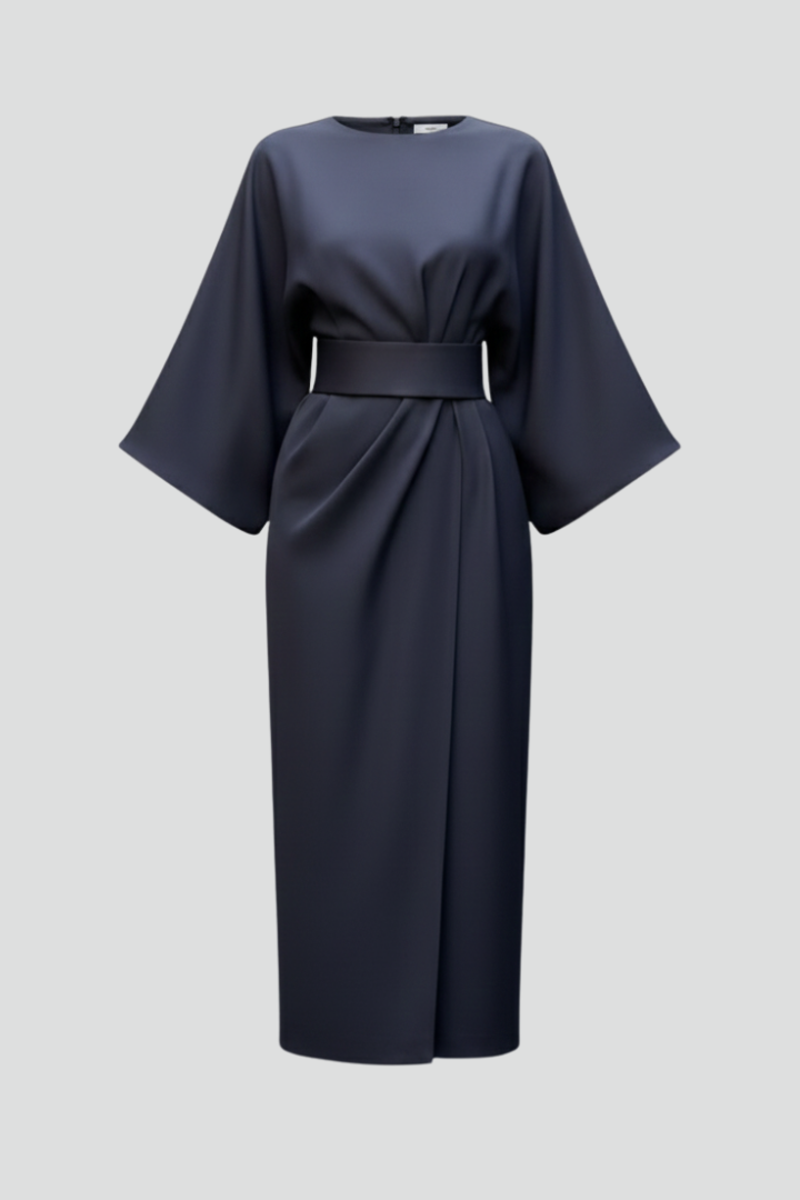 Navy midi dress on a plain grey background, showing wide sleeves, gathered waist and wrap skirt 1