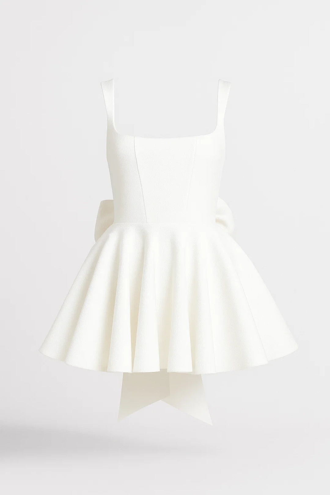 Cream mini dress with square neckline, corseted bodice and full flared skirt, bow trailing at the back 1