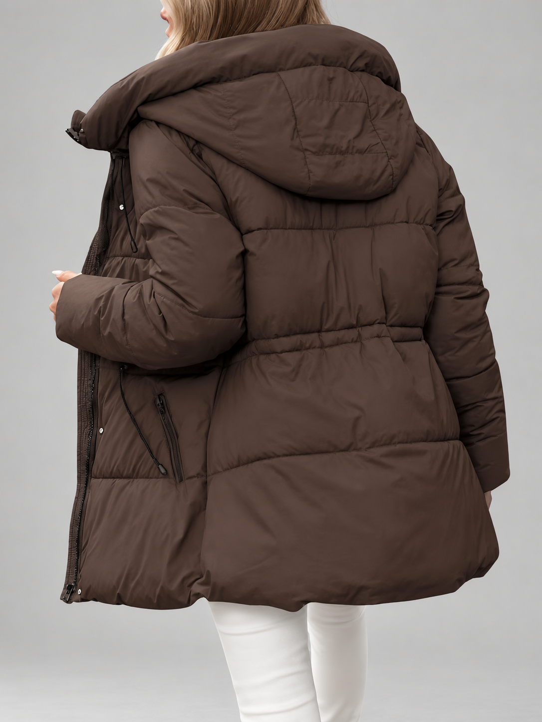 Back view of the brown padded coat showing the quilted hood, gathered waist and horizontal padded panels 5