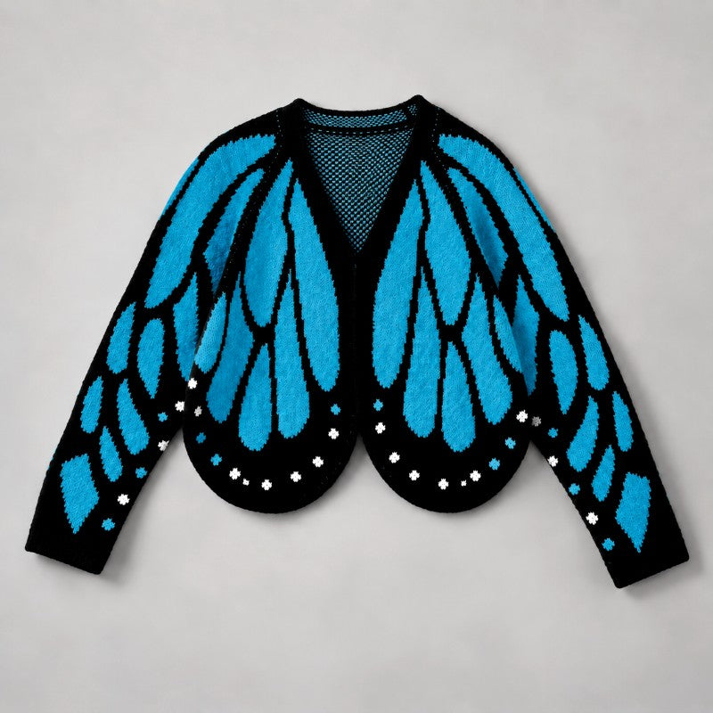 Flat lay of the cropped cardigan in turquoise and black, with wing motifs across the front and sleeves 1