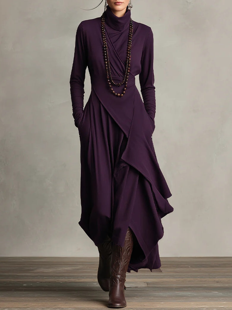Front view of the deep purple dress worn with beaded necklaces and tooled brown leather boots 1