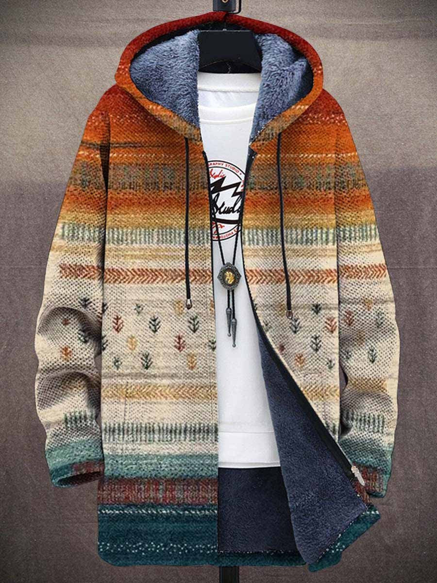 Front of the long hooded cardigan, zipped open to show blue fleece lining over a white top 1