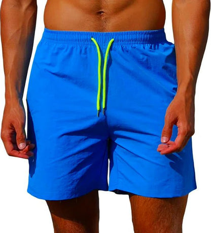 Bright blue swim trunks with a neon yellow drawstring, shown from the front on a model. 11
