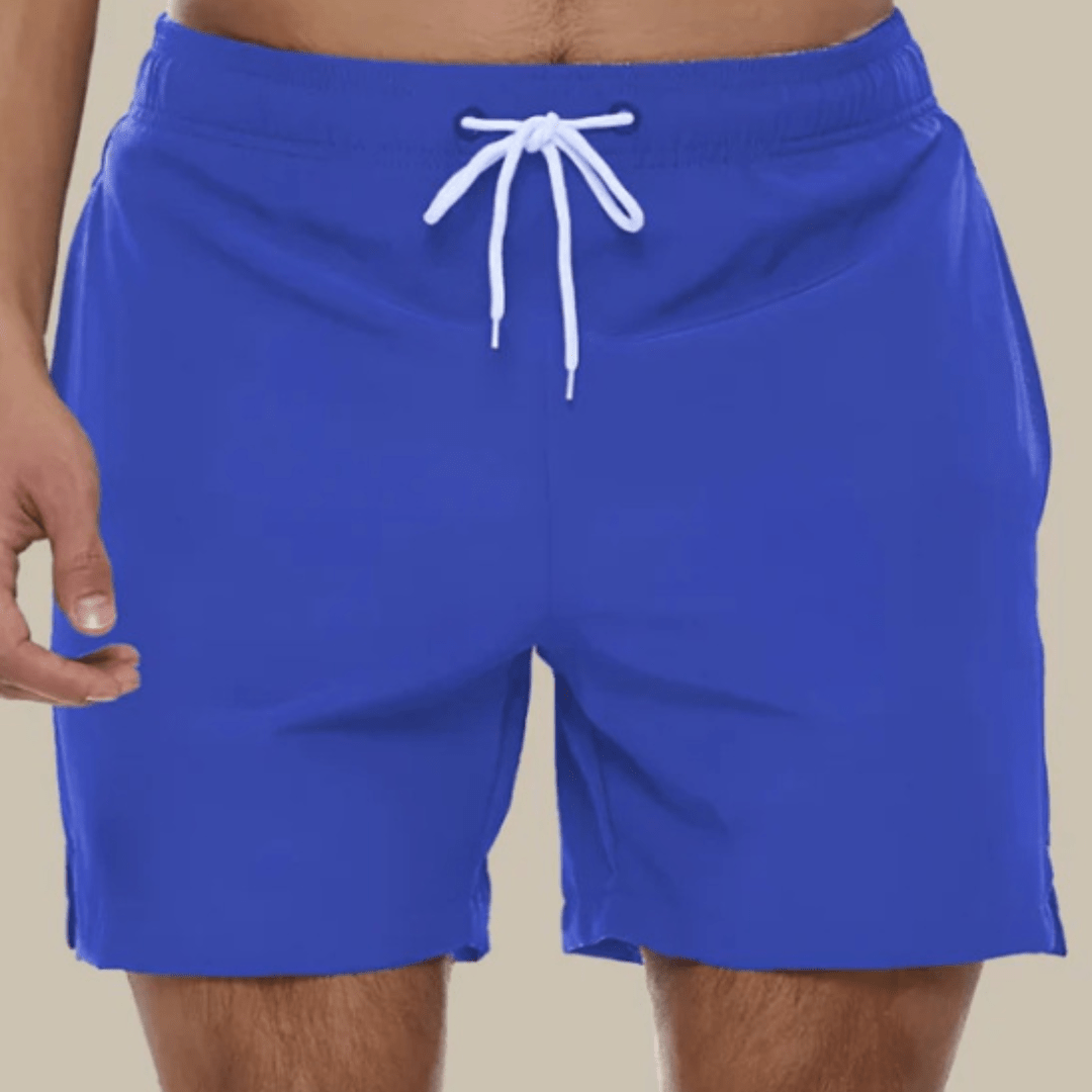 Front view of royal blue swim trunks with a white drawstring and small side slits at the hems. 5