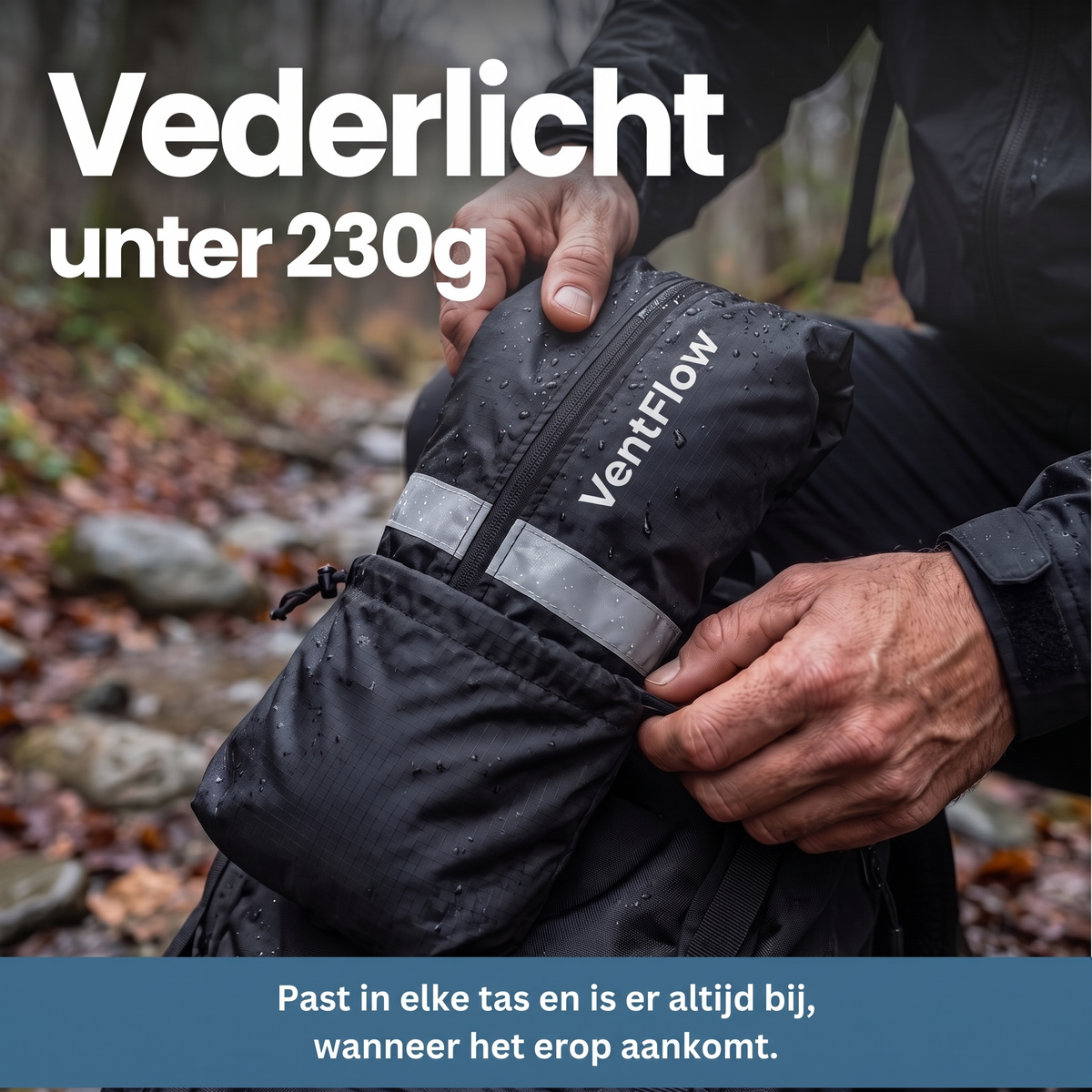 Hands pulling the black jacket from a small zipped pouch with a reflective strip, water droplets on the fabric, woodland behind. 10