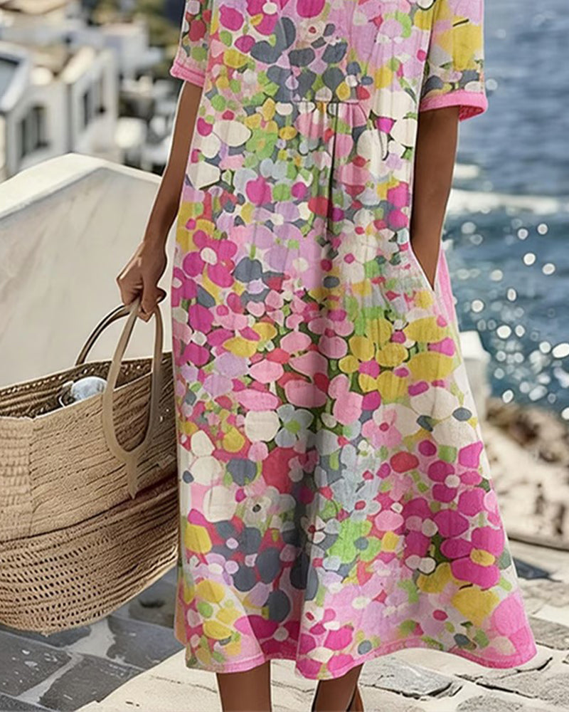 Detail of the pink floral dress's flowing skirt, side pocket and hem, with a woven basket alongside 4