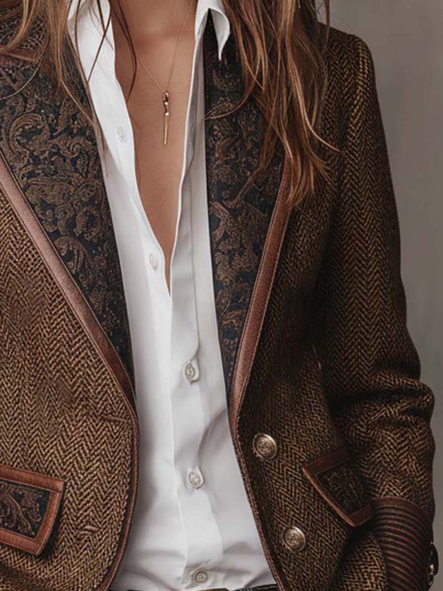 Close-up of the open front with metal buttons, patterned lapels and a white shirt underneath 7