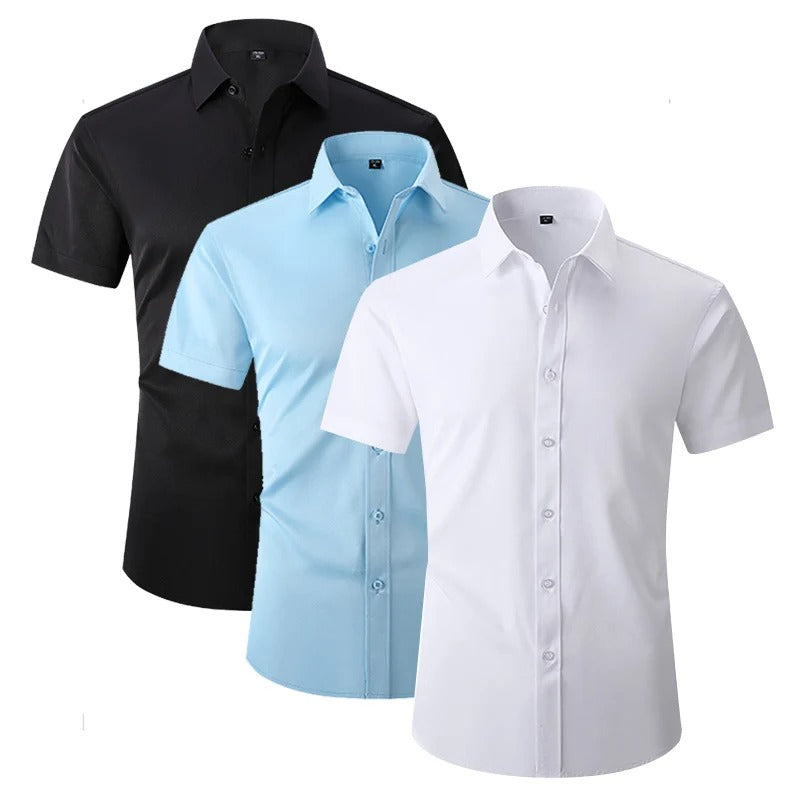 Black, light blue and white short-sleeved shirts shown together, overlapping, to compare the available colours 6