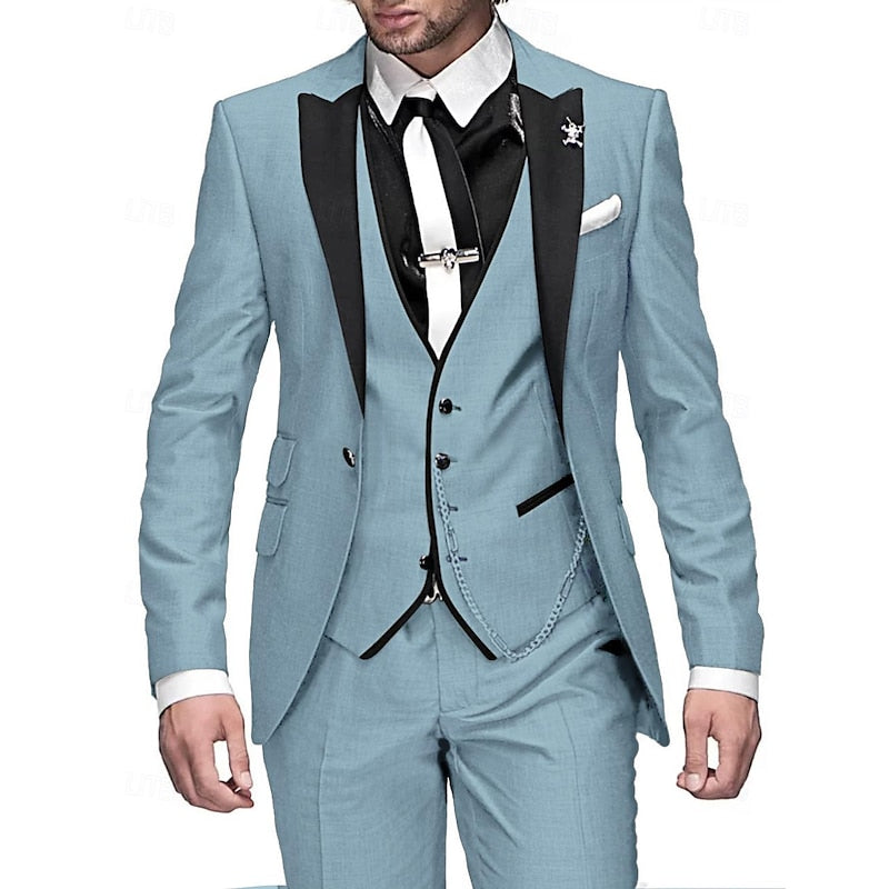 Model in a light blue three-piece suit with black peak lapels, black waistcoat trim, white tie and matching chain. 4